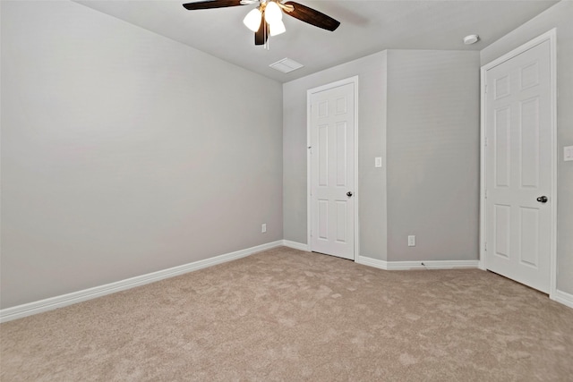 9408 Caddo Ridge Ln, Cypress, TX 77433 - unfurnished bedroom with light colored carpet and a ceiling fan