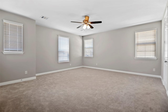 9408 Caddo Ridge Ln, Cypress, TX 77433 - spare room featuring a ceiling fan and carpet flooring