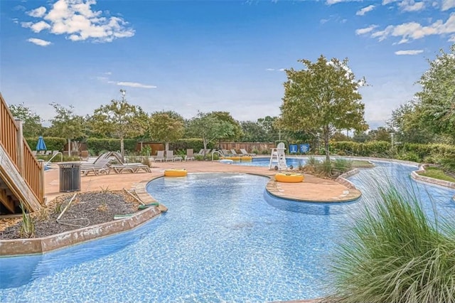 community pool with a patio