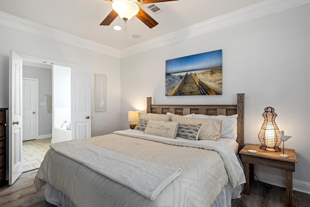 bedroom featuring visible vents, baseboards, a ceiling fan, wood finished floors, and crown molding