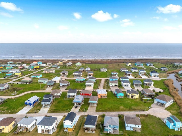 aerial view with a residential view and a water view