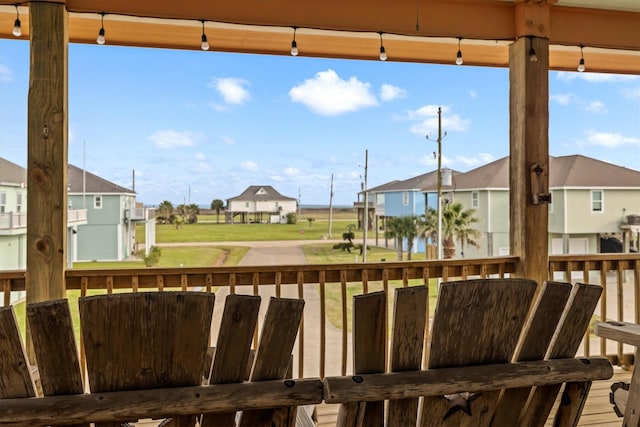 wooden terrace featuring a residential view