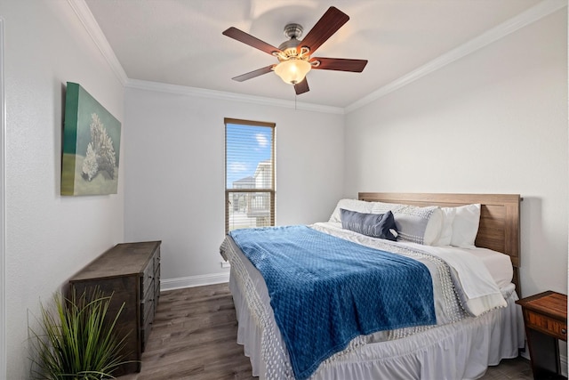 bedroom featuring dark wood finished floors, baseboards, crown molding, and a ceiling fan