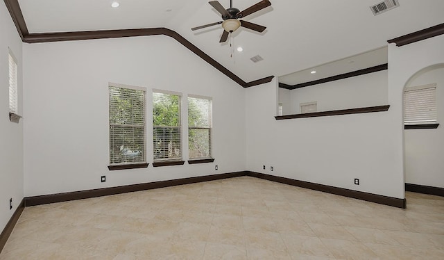 spare room featuring visible vents, a ceiling fan, baseboards, and ornamental molding