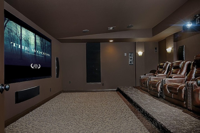home theater room featuring carpet floors, recessed lighting, a raised ceiling, and baseboards