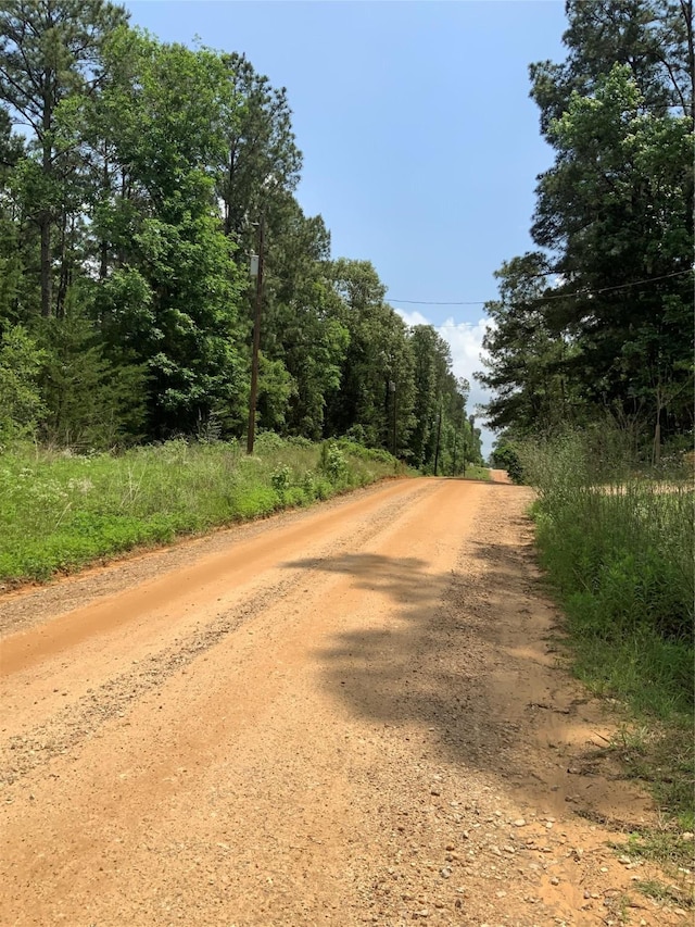 view of street featuring a view of trees