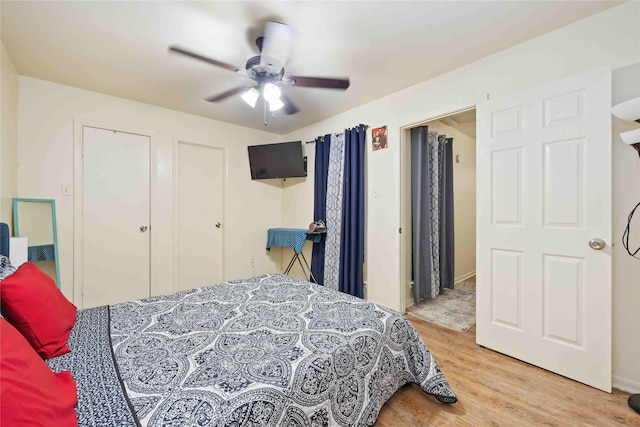 bedroom featuring wood finished floors and a ceiling fan