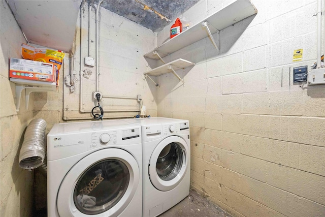 washroom with washer and dryer and laundry area