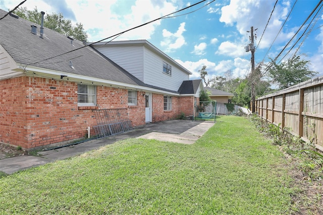 view of yard with a fenced backyard and a patio area