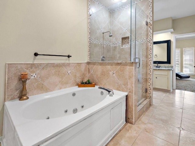 6729 Tournament Dr, Houston, TX 77069 - bathroom with a stall shower, a tub with jets, vanity, and tile patterned flooring