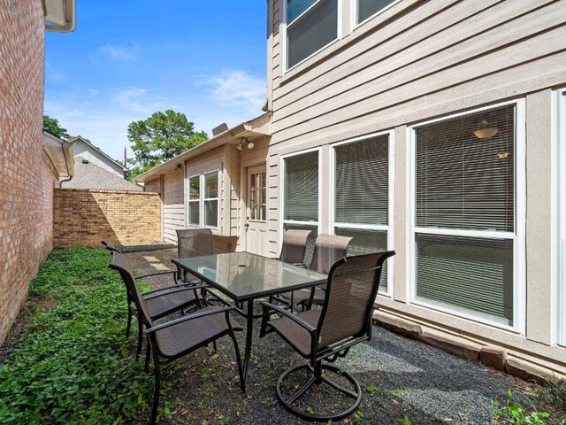 6729 Tournament Dr, Houston, TX 77069 - view of patio with outdoor dining area