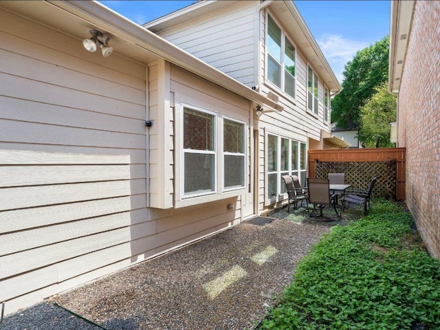 6729 Tournament Dr, Houston, TX 77069 - view of home's exterior featuring a patio and outdoor dining space