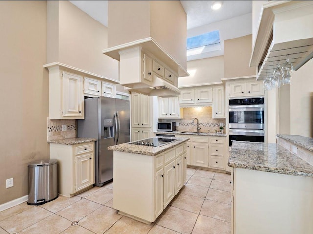 6729 Tournament Dr, Houston, TX 77069 - kitchen with appliances with stainless steel finishes, light tile patterned flooring, decorative backsplash, and a high ceiling