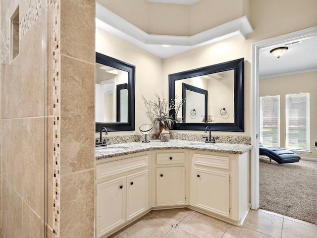 6729 Tournament Dr, Houston, TX 77069 - bathroom featuring double vanity, tile patterned floors, and crown molding