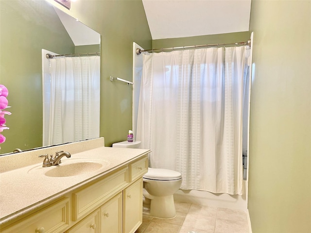 full bathroom with lofted ceiling, shower / tub combo, toilet, tile patterned floors, and vanity