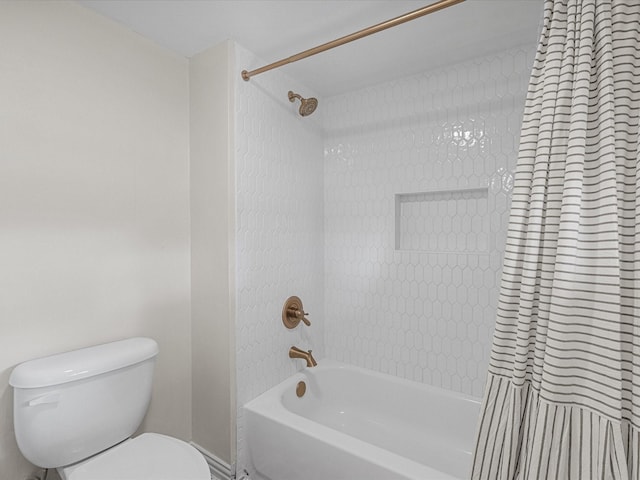 3003 Sky Ranch Dr, Alvin, TX 77511 - bathroom with shower / tub combo with curtain and toilet