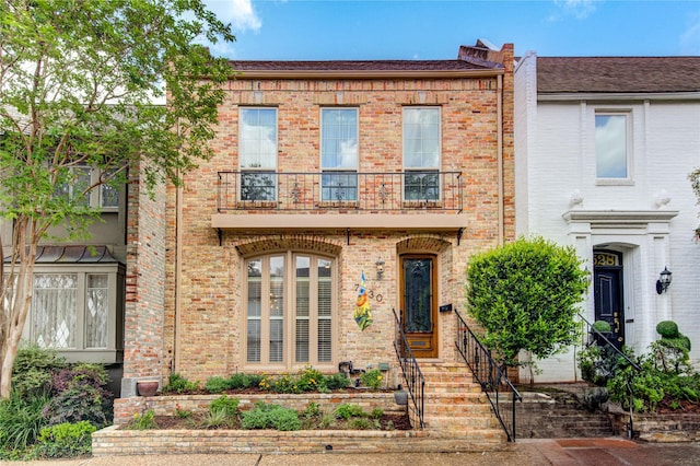 7530 Del Monte Dr, Houston, TX 77063 - townhome / multi-family property with brick siding and a balcony