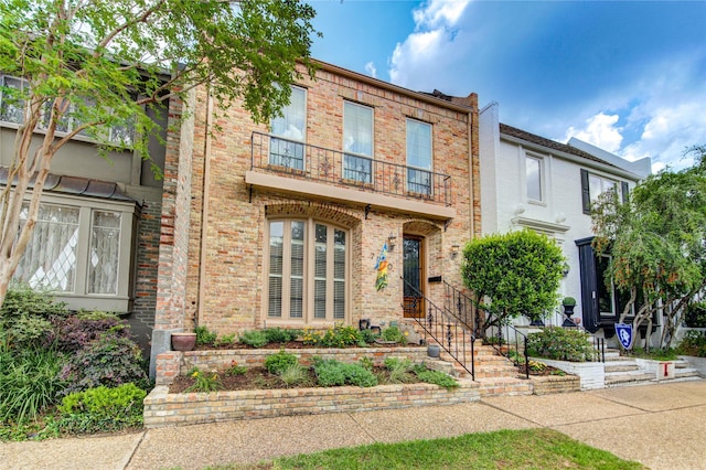 7530 Del Monte Dr, Houston, TX 77063 - view of front of home with brick siding and a balcony