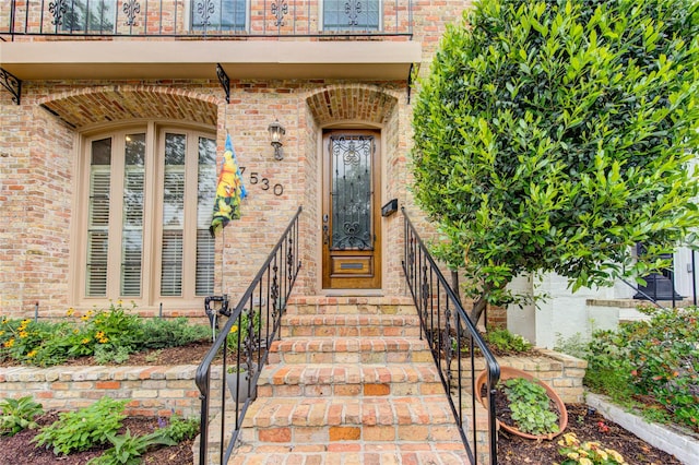 7530 Del Monte Dr, Houston, TX 77063 - doorway to property with brick siding