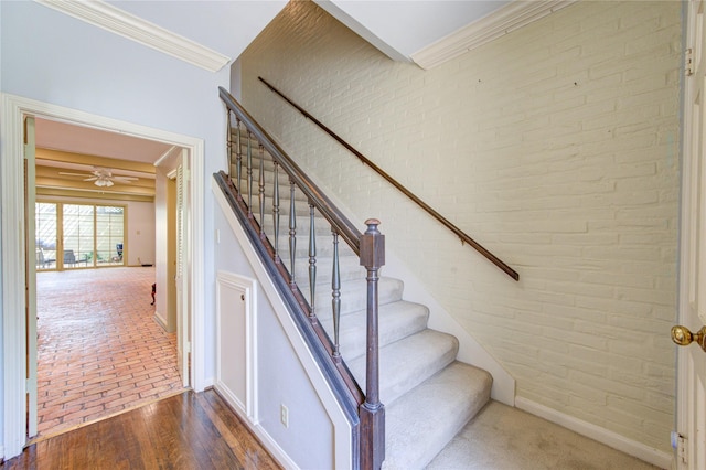 7530 Del Monte Dr, Houston, TX 77063 - stairway with brick wall and ornamental molding