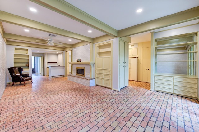 7530 Del Monte Dr, Houston, TX 77063 - unfurnished living room with crown molding, ceiling fan, brick floor, a brick fireplace, and beamed ceiling