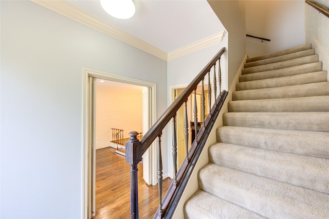 7530 Del Monte Dr, Houston, TX 77063 - stairway with crown molding and wood finished floors