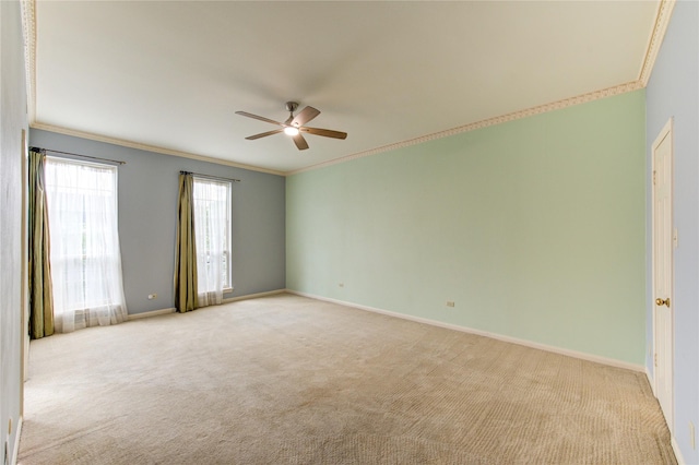 7530 Del Monte Dr, Houston, TX 77063 - spare room featuring crown molding, ceiling fan, carpet floors, and baseboards