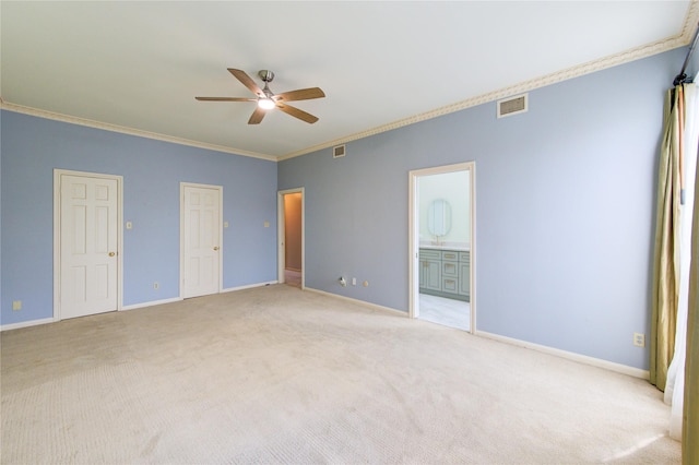 7530 Del Monte Dr, Houston, TX 77063 - unfurnished bedroom featuring visible vents, ornamental molding, baseboards, and light colored carpet