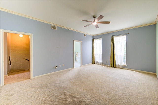 7530 Del Monte Dr, Houston, TX 77063 - empty room featuring a ceiling fan, visible vents, baseboards, carpet floors, and ornamental molding