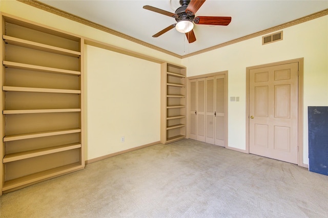 7530 Del Monte Dr, Houston, TX 77063 - unfurnished bedroom with visible vents, carpet, crown molding, and baseboards
