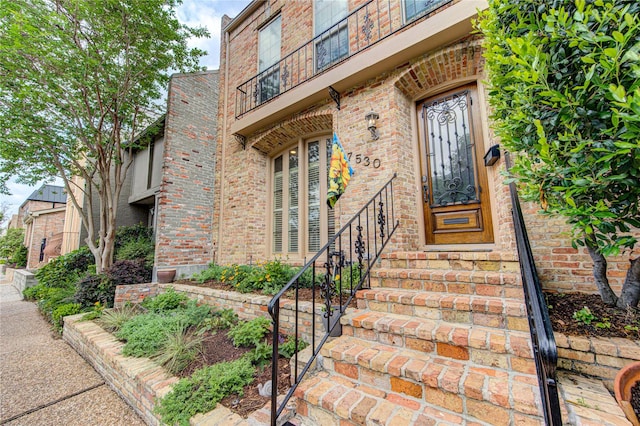 7530 Del Monte Dr, Houston, TX 77063 - view of exterior entry featuring brick siding