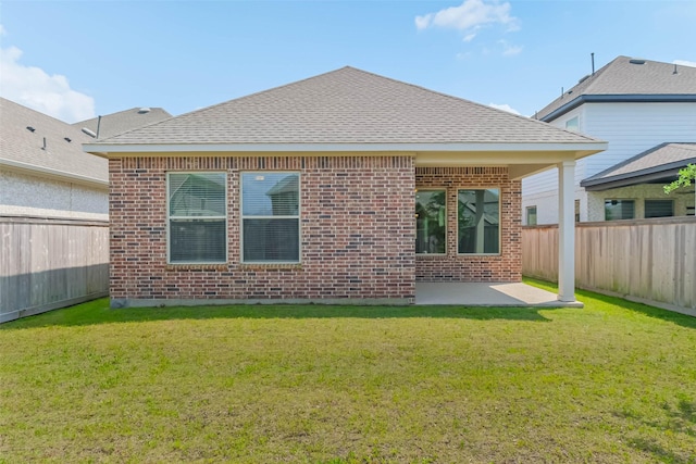 19622 Upper Canyon Ct, Cypress, TX 77433 - rear view of property featuring brick siding, a fenced backyard, and a yard