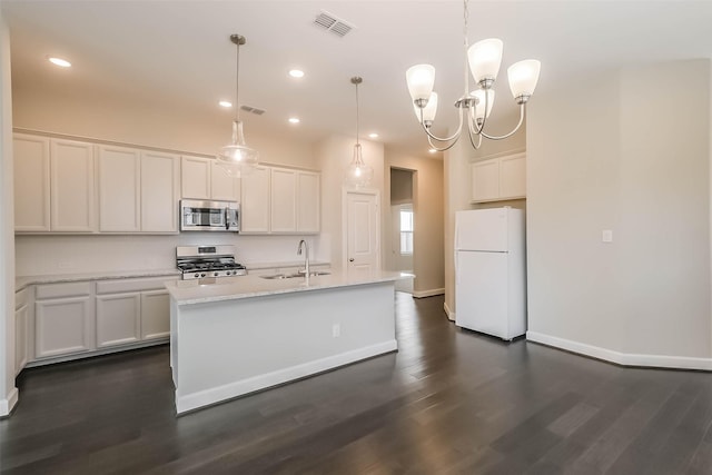 19622 Upper Canyon Ct, Cypress, TX 77433 - kitchen with a sink, dark wood-style flooring, stainless steel appliances, and light countertops