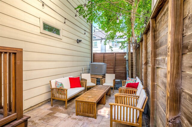 5733 Petty St, Houston, TX 77007 - view of patio / terrace with outdoor lounge area, fence, and cooling unit