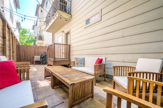 5733 Petty St, Houston, TX 77007 - wooden terrace featuring an outdoor hangout area, a patio area, and fence