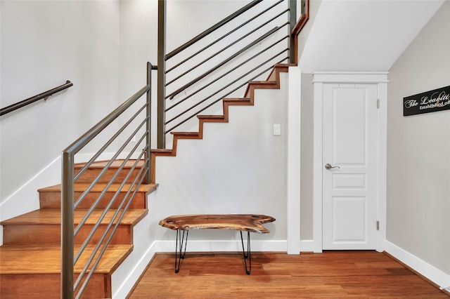 5733 Petty St, Houston, TX 77007 - staircase with wood finished floors and baseboards