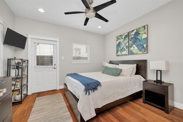 5733 Petty St, Houston, TX 77007 - bedroom featuring wood finished floors, ceiling fan, recessed lighting, and baseboards