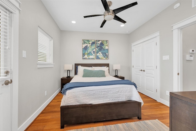 5733 Petty St, Houston, TX 77007 - bedroom featuring wood finished floors, baseboards, a closet, recessed lighting, and ceiling fan