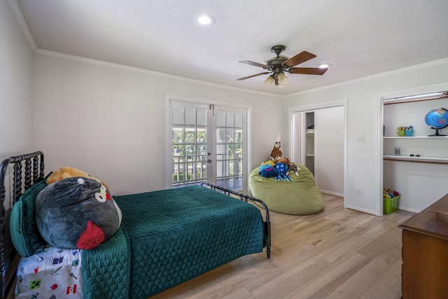 bedroom with wood finished floors, access to outside, ceiling fan, and crown molding