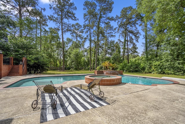 17003 Creeksouth Rd, Houston, TX 77068 - view of swimming pool featuring a patio, stairs, and a pool with connected hot tub