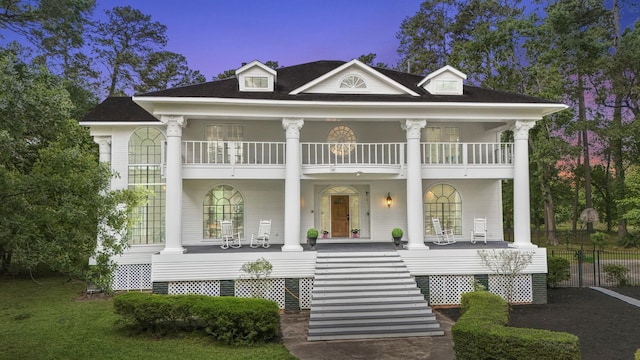 17003 Creeksouth Rd, Houston, TX 77068 - neoclassical / greek revival house featuring a balcony, covered porch, and stairs