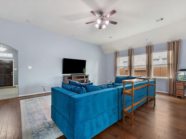 2820 Pranzo Ln, League City, TX 77573 - living room with visible vents, lofted ceiling, hardwood / wood-style floors, baseboards, and a ceiling fan