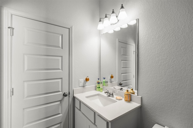 6930 Goldstrum Way, Katy, TX 77493 - bathroom with a textured wall and vanity