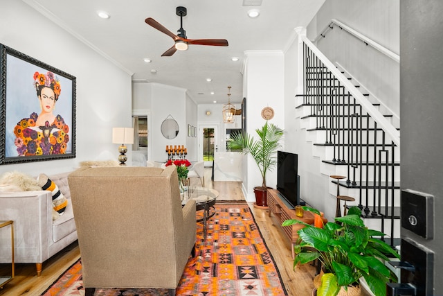 living room featuring recessed lighting, wood finished floors, a ceiling fan, and ornamental molding