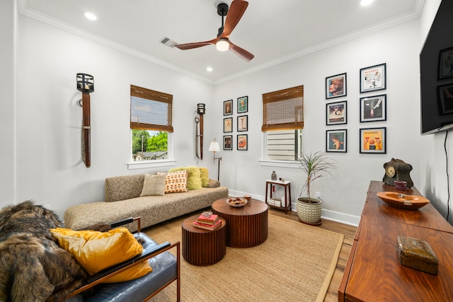 living area with recessed lighting, wood finished floors, visible vents, baseboards, and ceiling fan