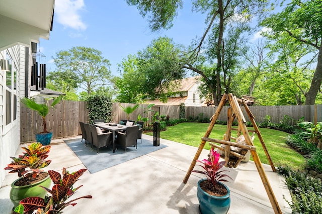 view of patio / terrace featuring outdoor dining space and a fenced backyard