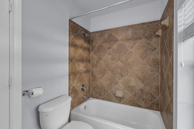 13811 Sugar Dock Ct, Houston, TX 77044 - full bathroom featuring toilet and shower / bath combination