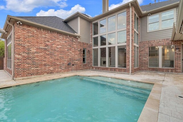 13811 Sugar Dock Ct, Houston, TX 77044 - swimming pool featuring a patio
