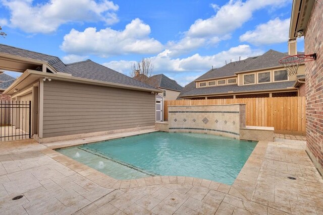13811 Sugar Dock Ct, Houston, TX 77044 - view of swimming pool with a fenced backyard and a patio