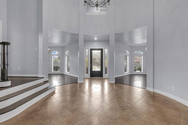 13811 Sugar Dock Ct, Houston, TX 77044 - entryway with a towering ceiling and a chandelier